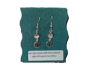 Earrings on Green Background