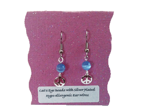 Earrings on Purple Background
