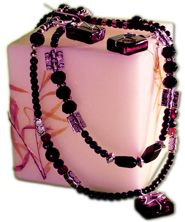 candle with necklace